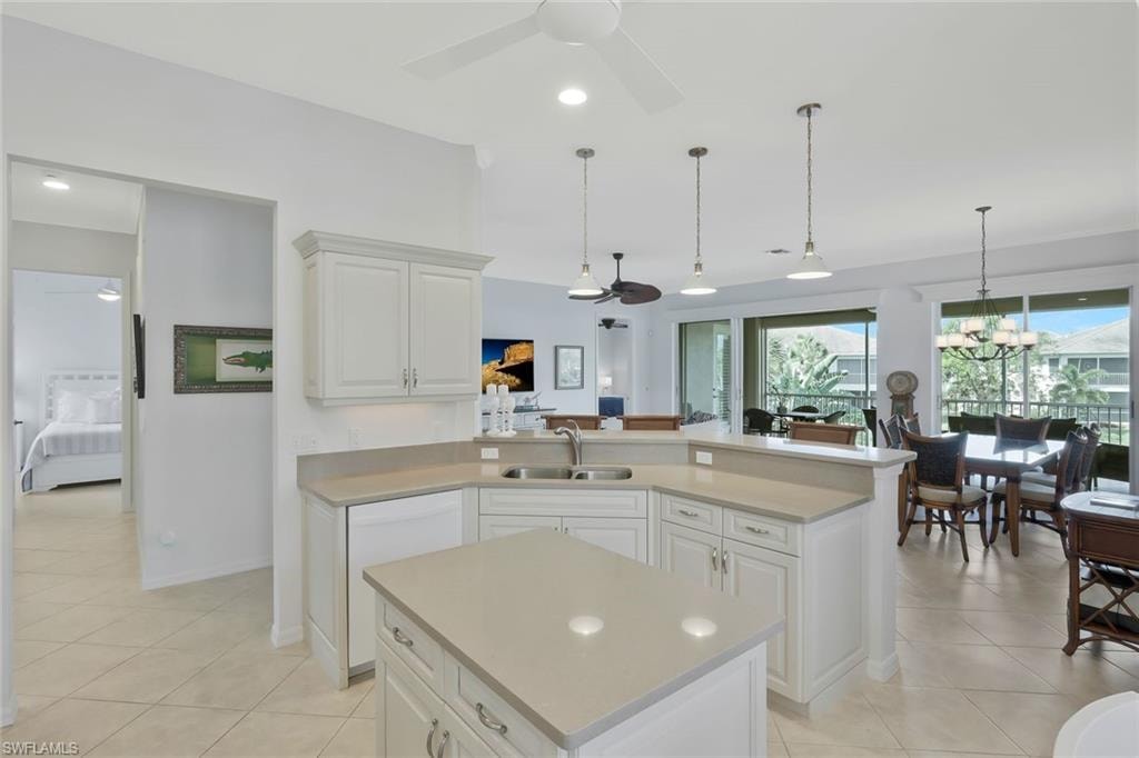 Open concept kitchen featuring a central island, generous counter space, and seamless connection to the main living areas.