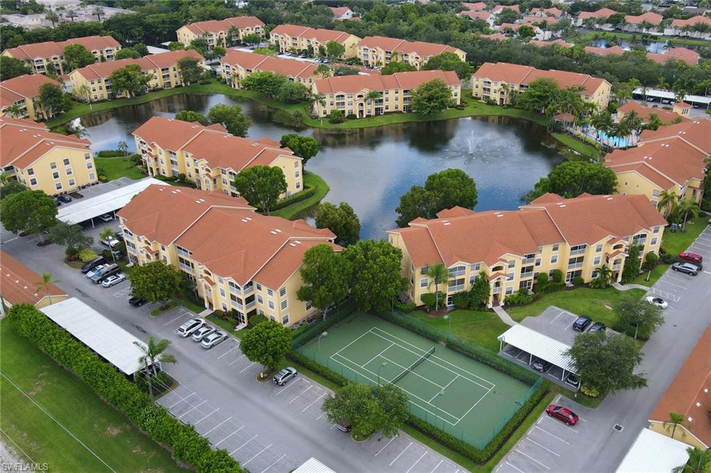 Aerial view of property's location with a nearby body of water