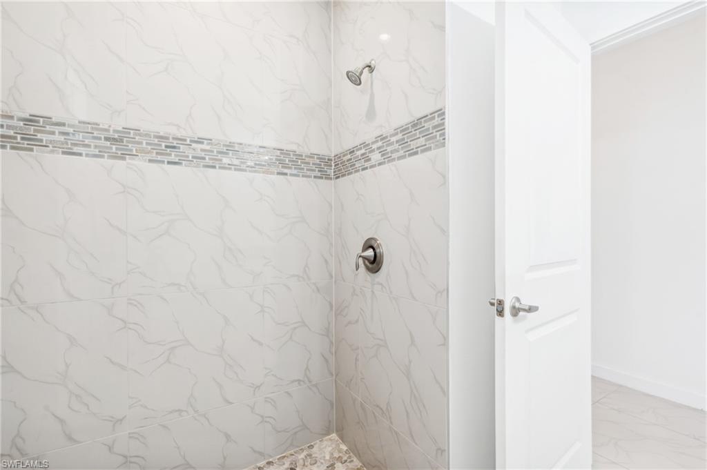 Bathroom with tiled shower