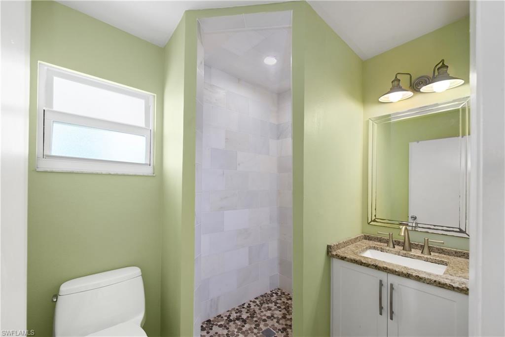 Sleek and modern bathroom with updated features - Virtually Edited Image