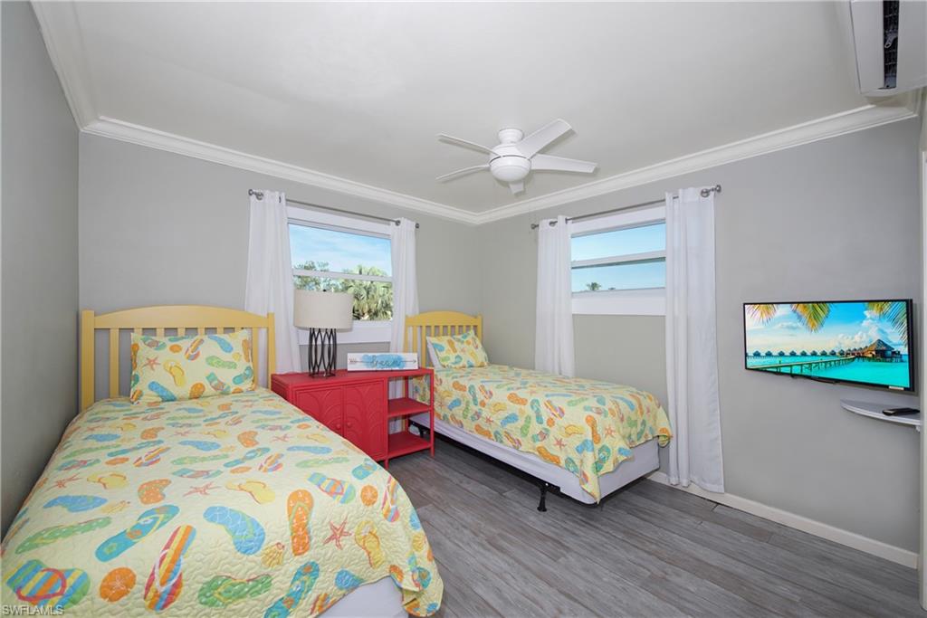Twin bedroom perfect for guests or family - Virtually Edited Image