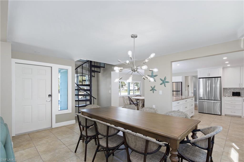 Comfortable dining space adjacent to the kitchen  - Virtually Edited Image