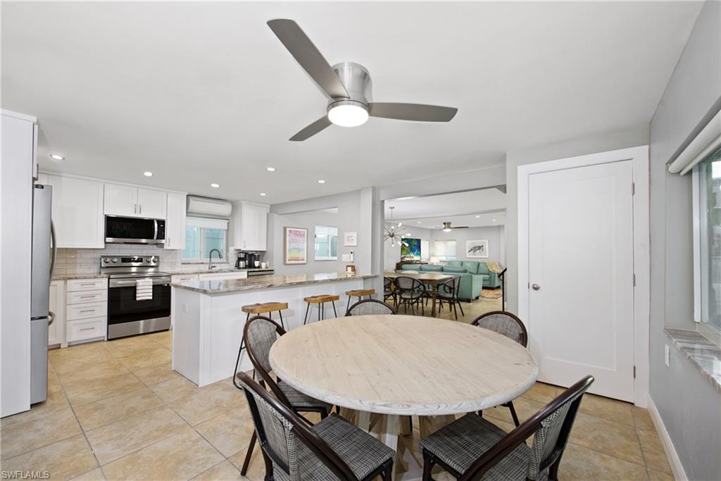 Open dining area ideal for entertaining - Virtually Edited Image