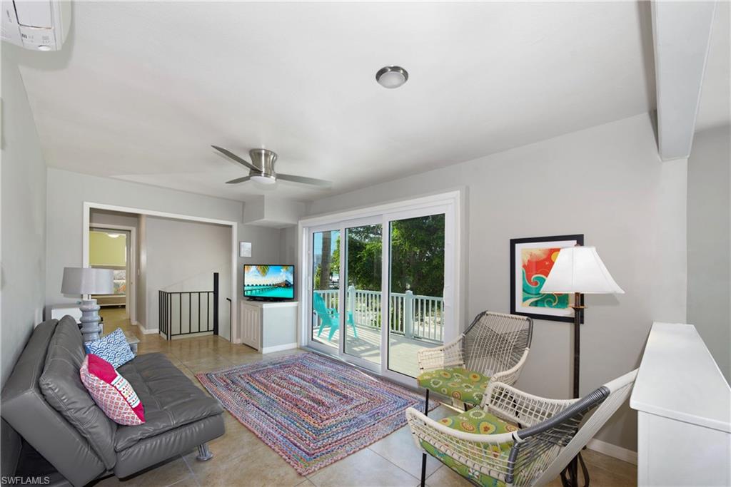 Spacious living area with ample natural light - Virtually Edited Image