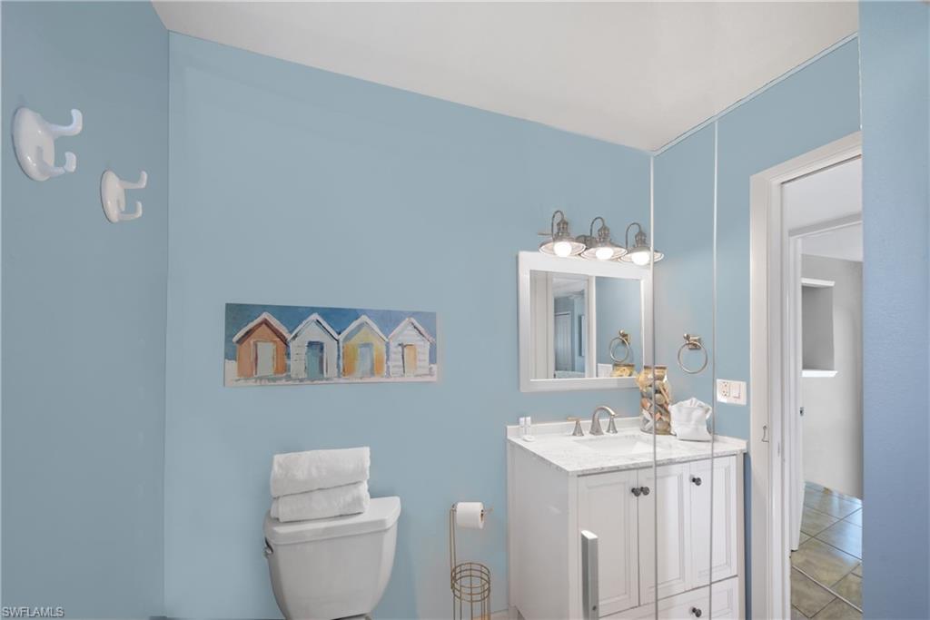 Elegant bathroom with a clean and sophisticated aesthetic - Virtually Edited Image