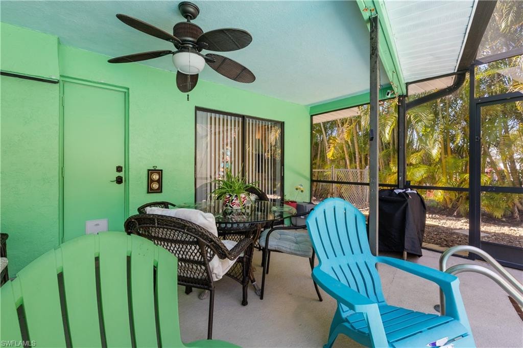 View of the Lanai Dining/Pool Deck with Slider to the West Ensuite [Note Newly Painted Whole House Exterior