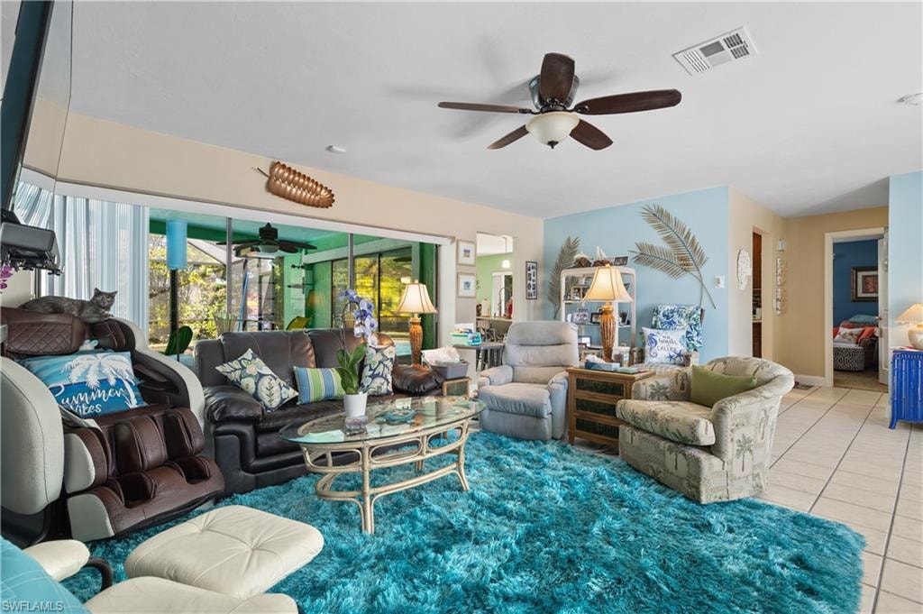 View of the Living Room with Pocketed Sliders to the Lanai/Pool Deck.