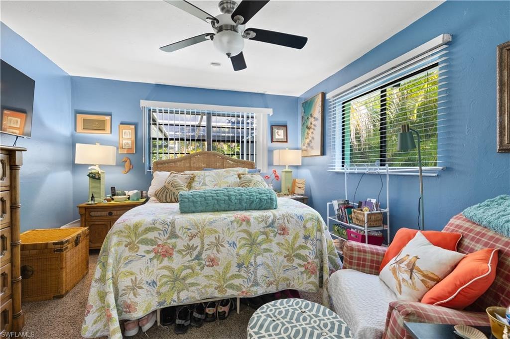 View of the Sunlit Eastside Ensuite with Lighted Ceiling Fan.