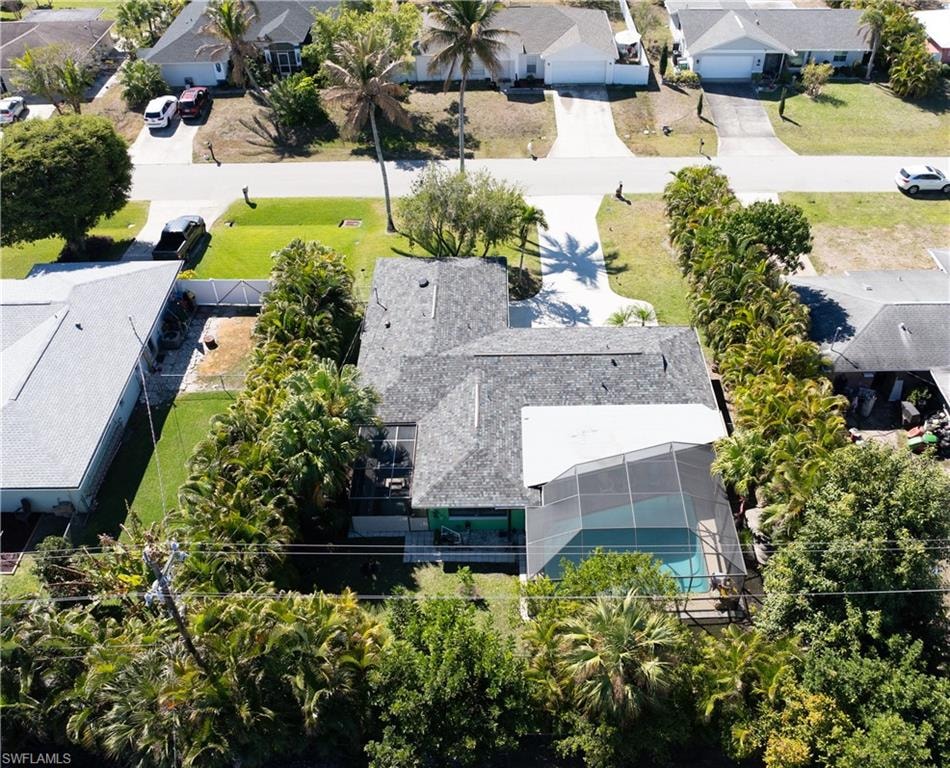 Aerial View of Property Rear with Fully L:ned Areca Palms for Privacy