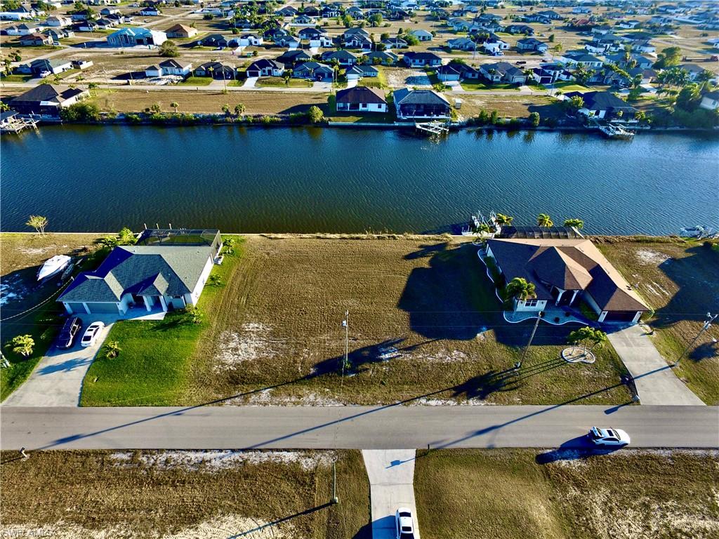 View of property location with a large body of water