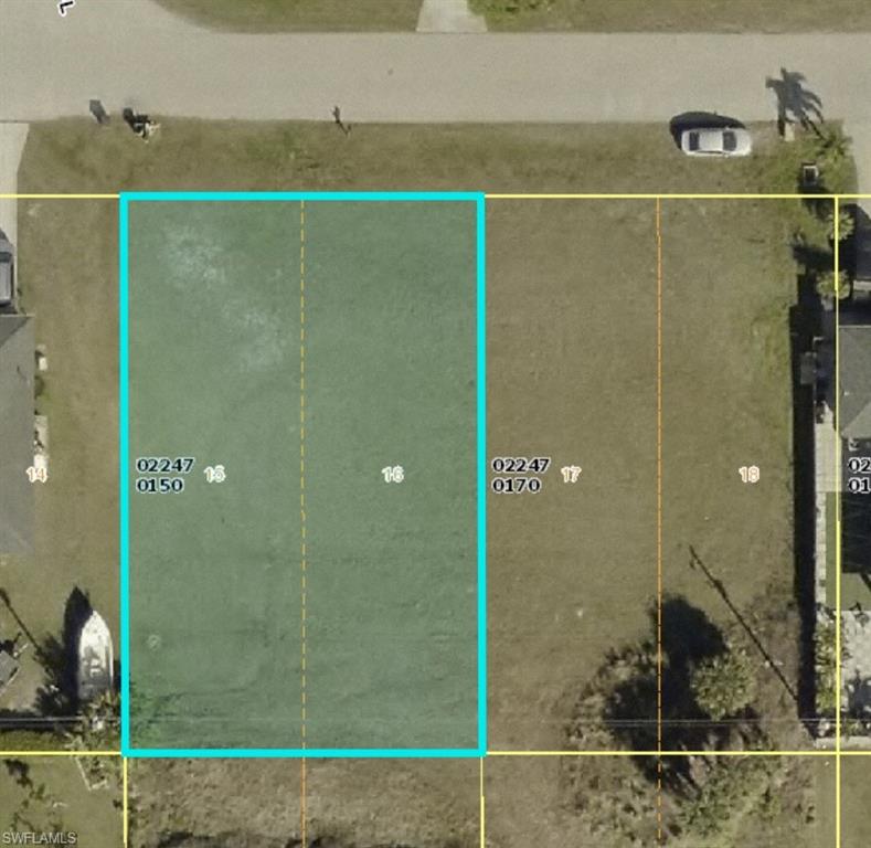 Aerial overview of property's location featuring property parcel outlined