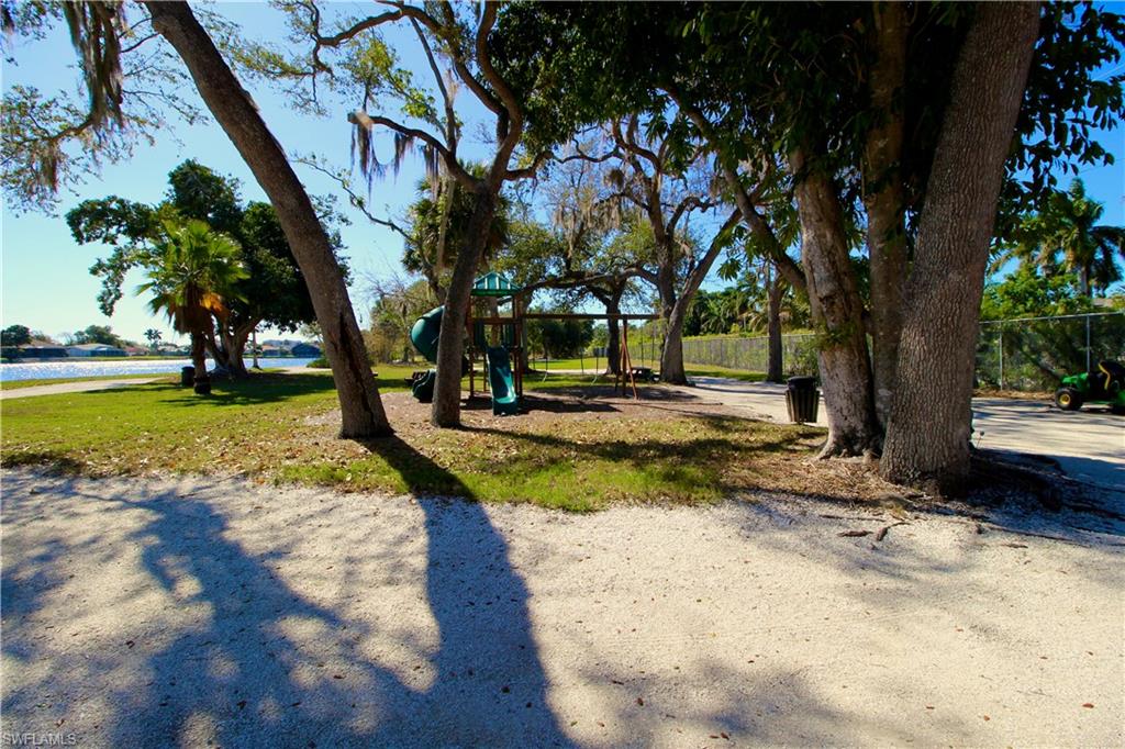 View of community walking park w/ playground