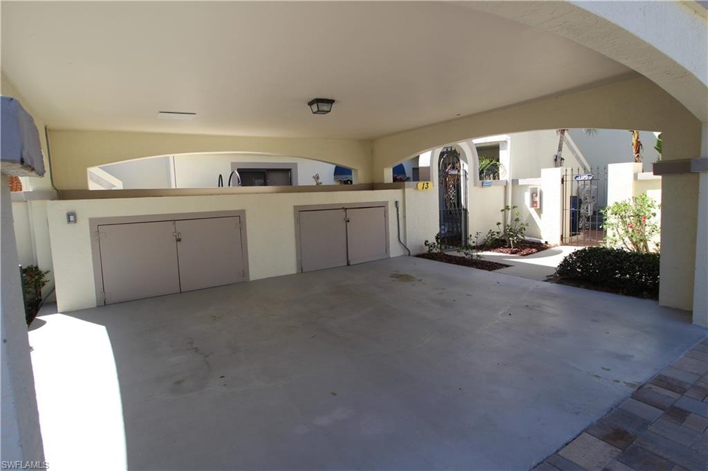 Unit carport on the left w/ private storage space