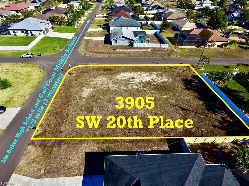 Aerial perspective of suburban area with property parcel outlined