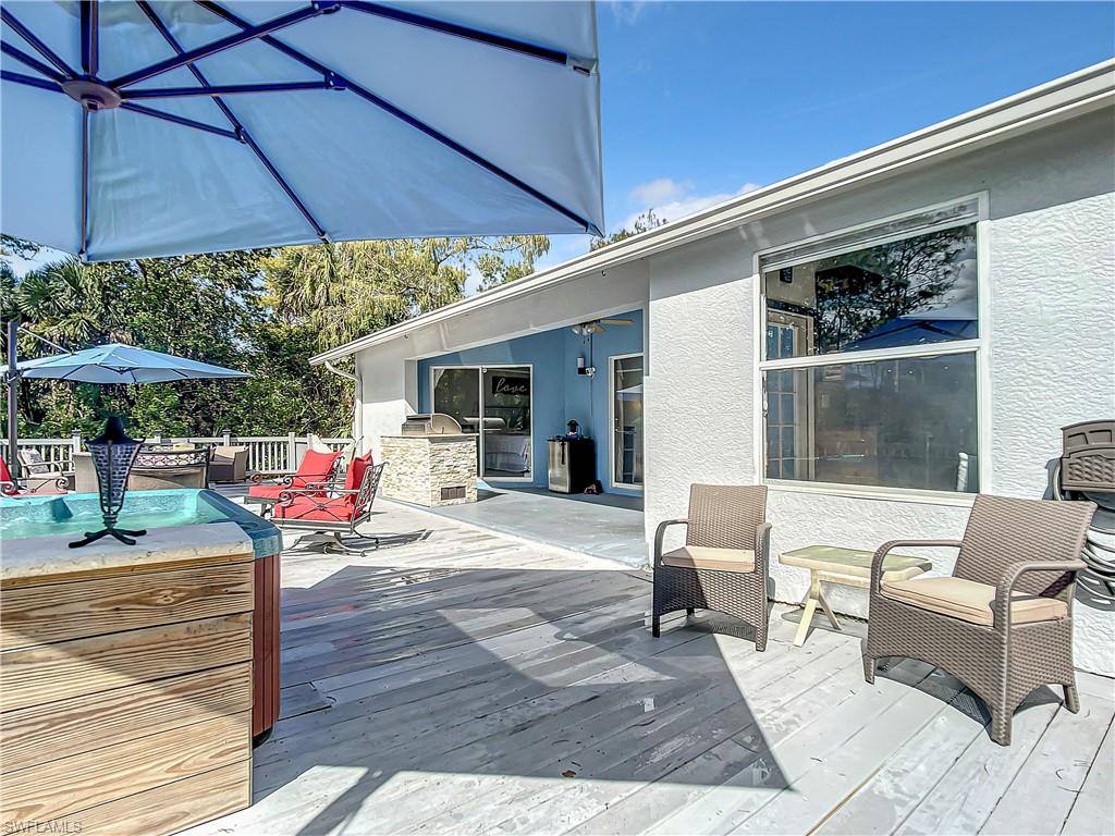 Wooden terrace with outdoor dining space