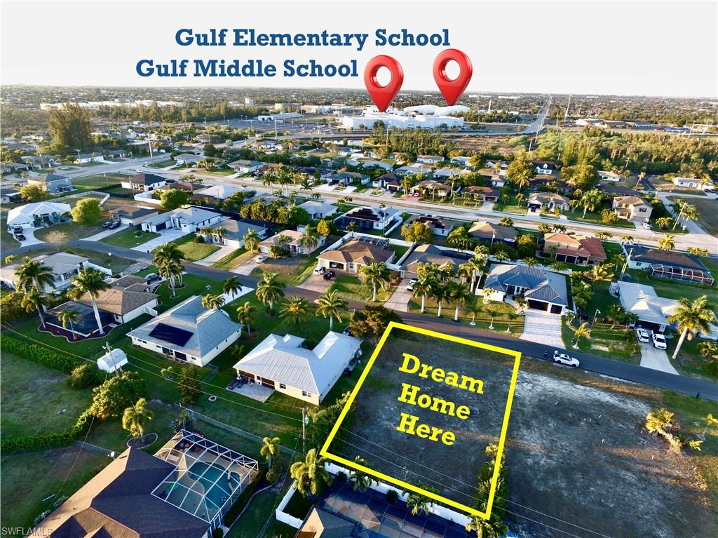 Aerial view of residential area featuring property parcel outlined