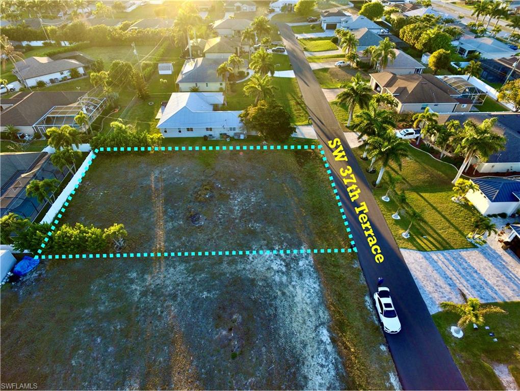 Aerial perspective of suburban area with property boundaries highlighted