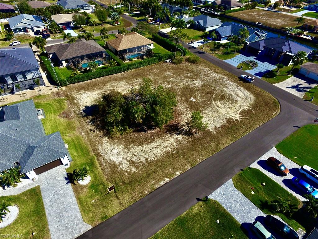 View of property location with nearby suburban area