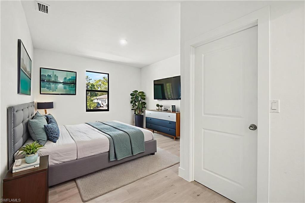 Bedroom with light wood-type flooring