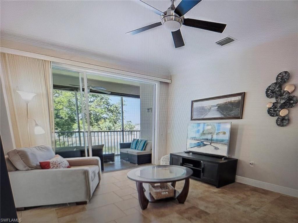 Living area featuring ceiling fan