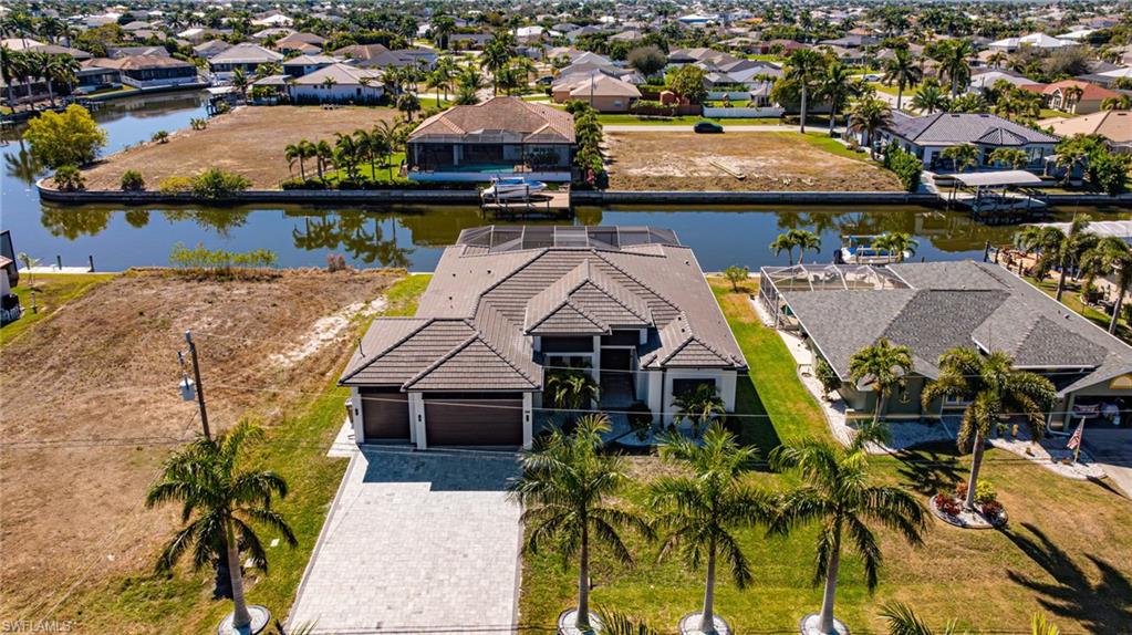 Aerial view of residential area with a large body of water