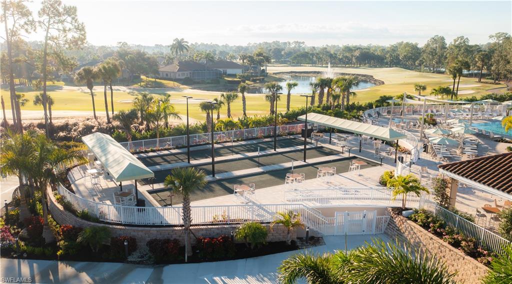 Bird's eye view of a local golf course and a nearby body of water