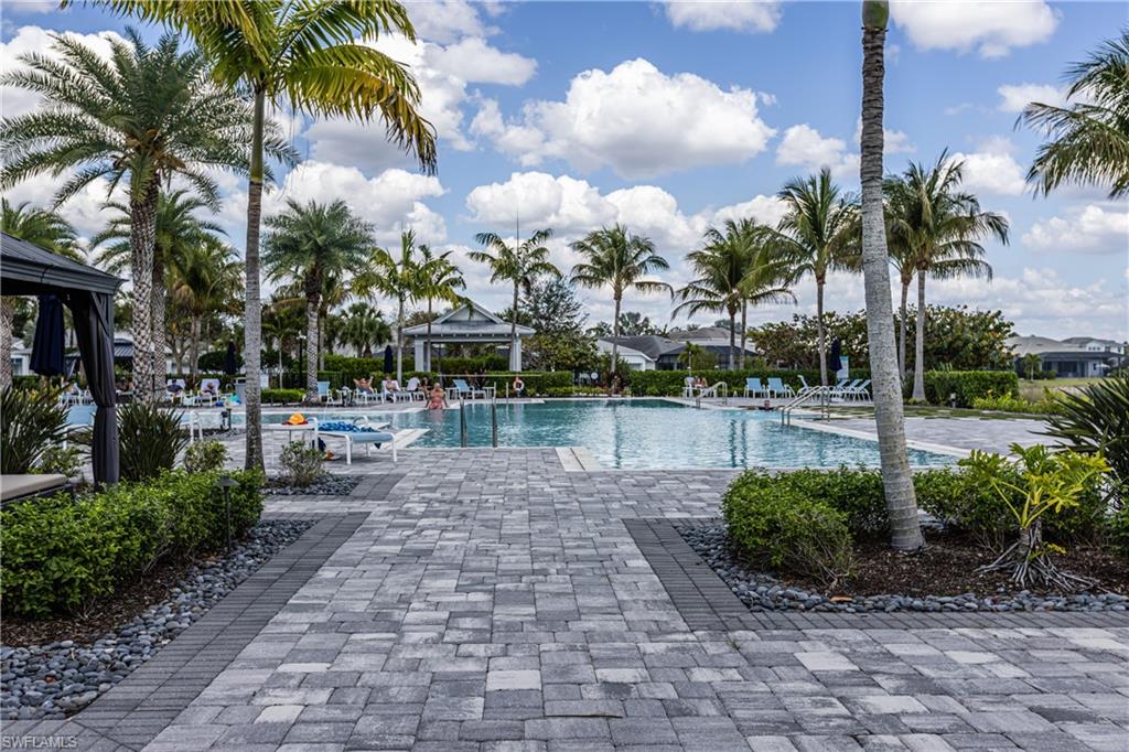 Community pool featuring a patio area