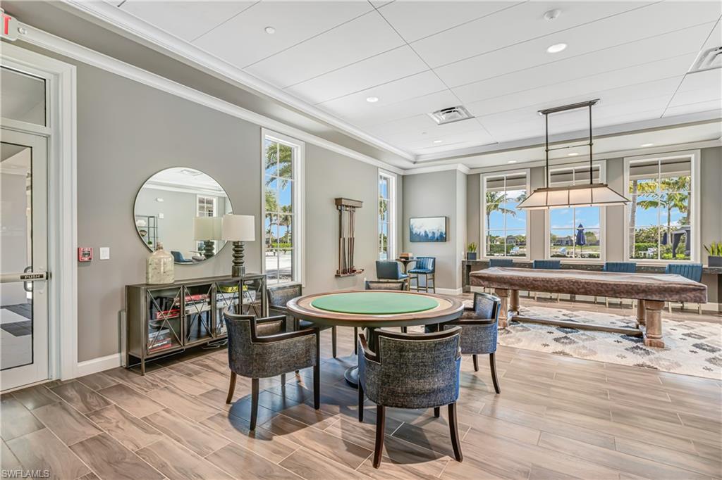 Rec room featuring billiards table, ornamental molding, and recessed lighting