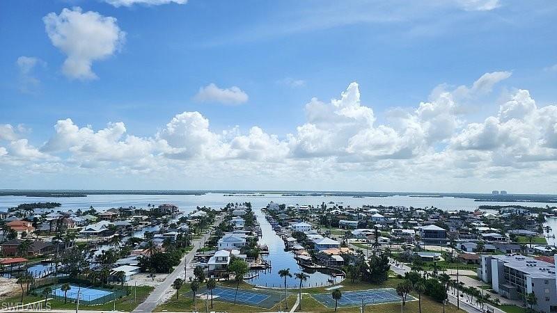 Aerial view of residential area with a nearby body of water