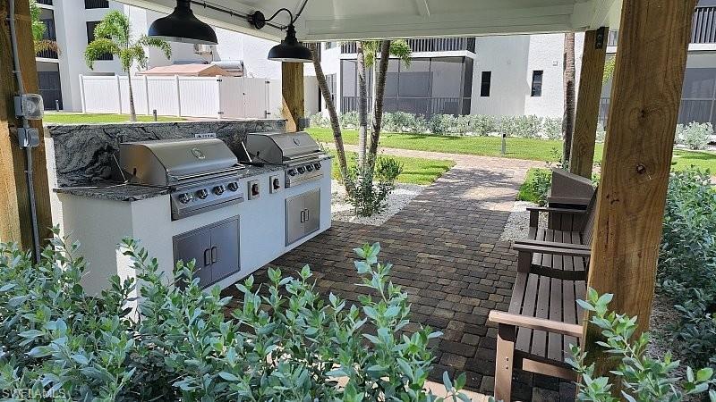 View of patio / terrace featuring exterior kitchen