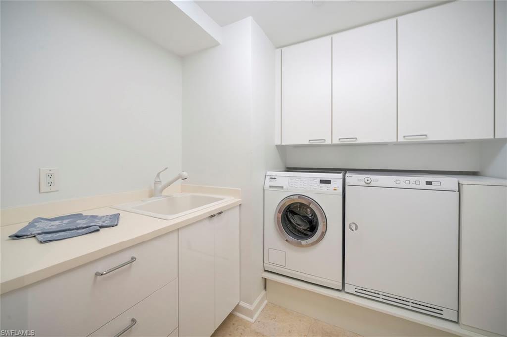 laundry room with storage