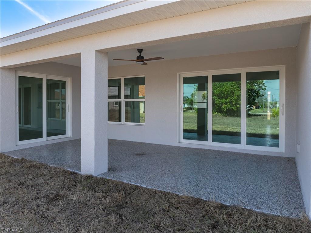 View of patio featuring a ceiling fan