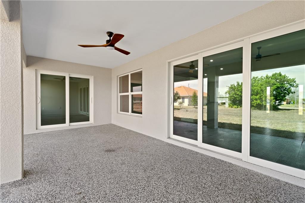 View of patio featuring ceiling fan