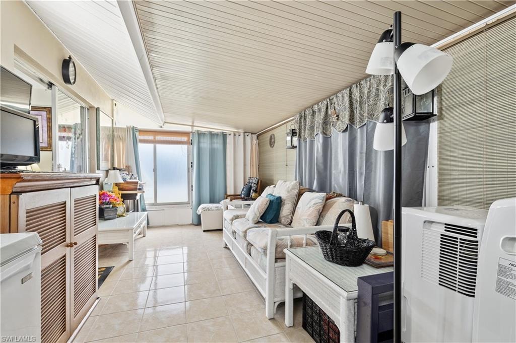 Sunroom with vaulted ceiling