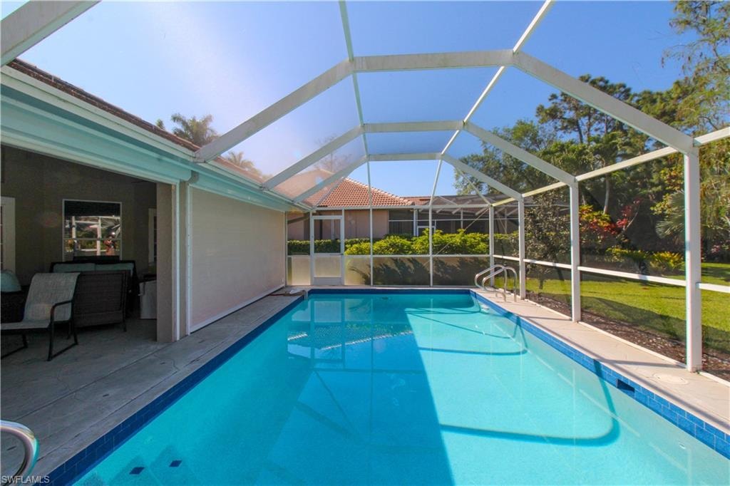 Pool with a patio and a lanai