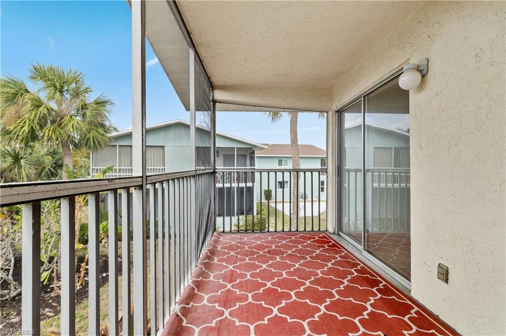 Screened Balcony featuring a sunroom
