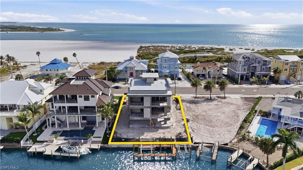 Aerial perspective of suburban area featuring a large body of water - Virtually Edited Image