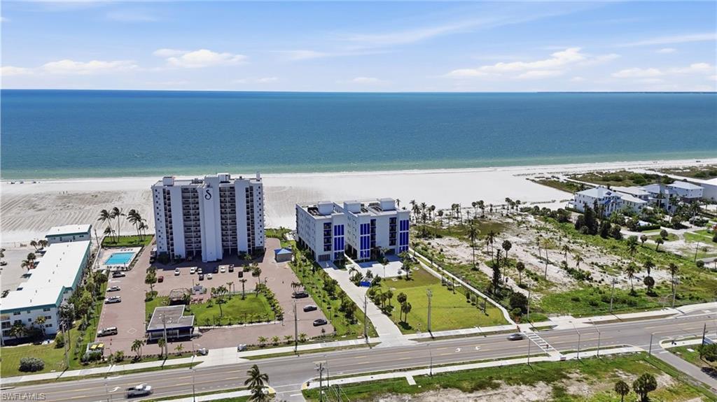 Expansive beachfront setting with direct access to the sand and ocean - Virtually Edited Image