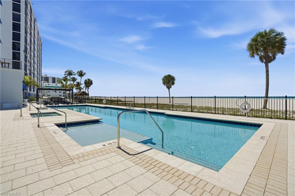 Community pool with a patio area