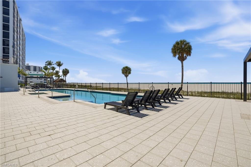 Community pool featuring a patio area