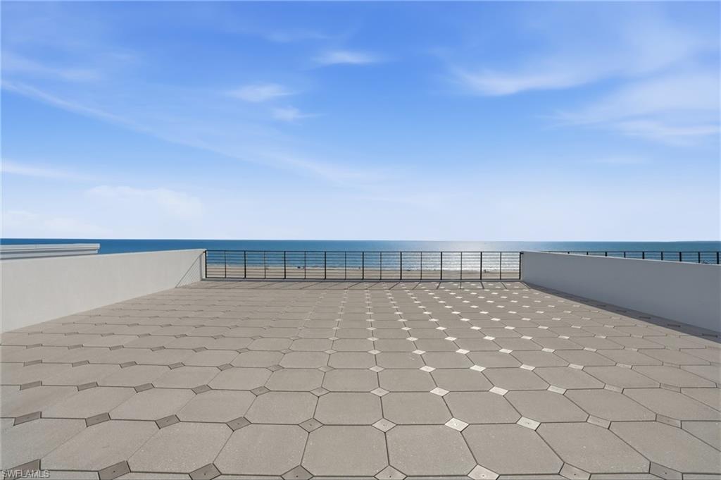 View of patio featuring a water view