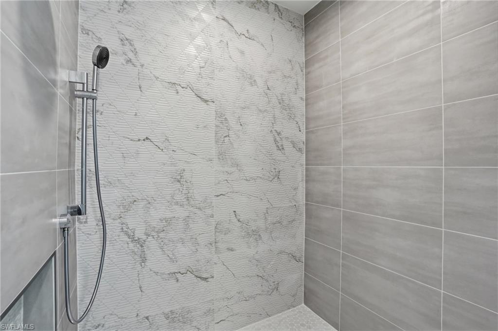 Bathroom with tiled shower