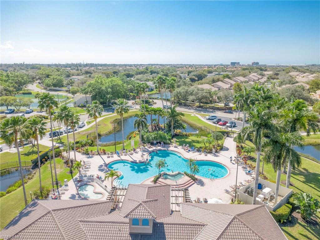 Bird's eye view of a pool and a large body of water