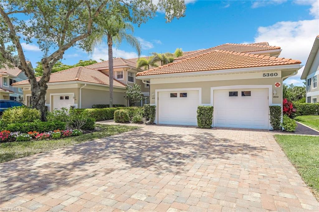 Unit #202 - Single Car Garage on Right.