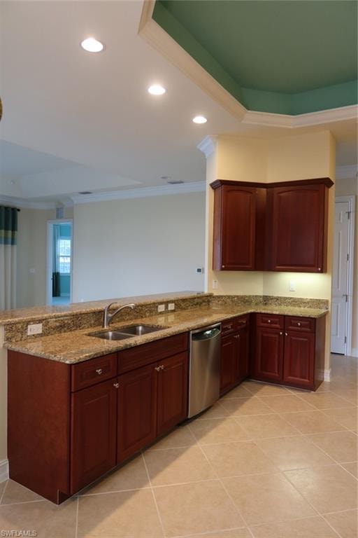 Kitchen featuring wood cabinetry, granite-finish countertops, and a double basin stainless steel sink with an integrated dishwasher