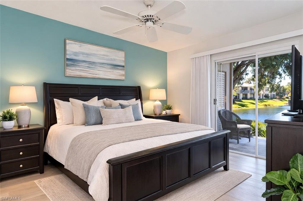 Bedroom with access to outside, ceiling fan, and light wood-style floors