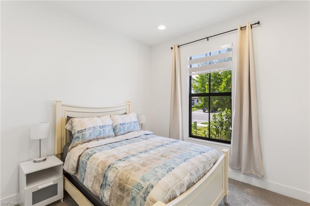Bedroom with carpet flooring and recessed lighting