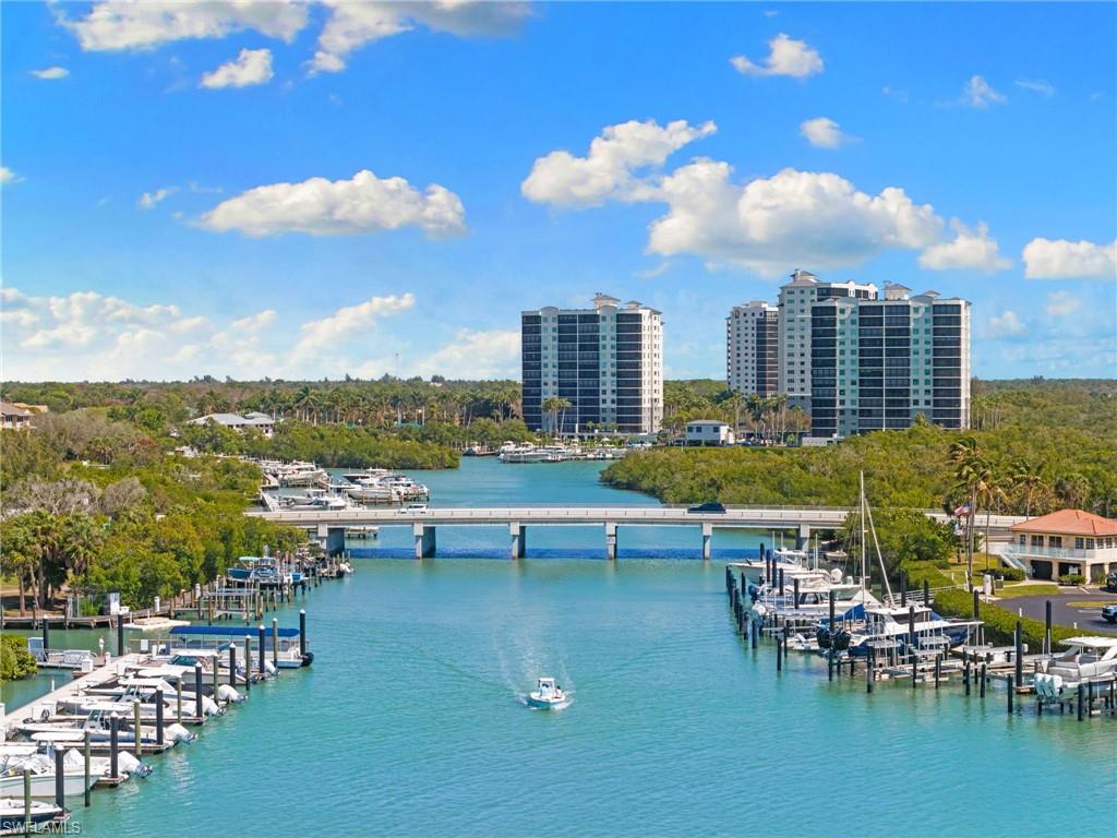 Water view featuring a marina and a boat dock