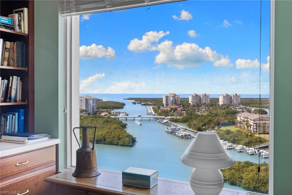 Water view featuring a marina and nearby urban area
