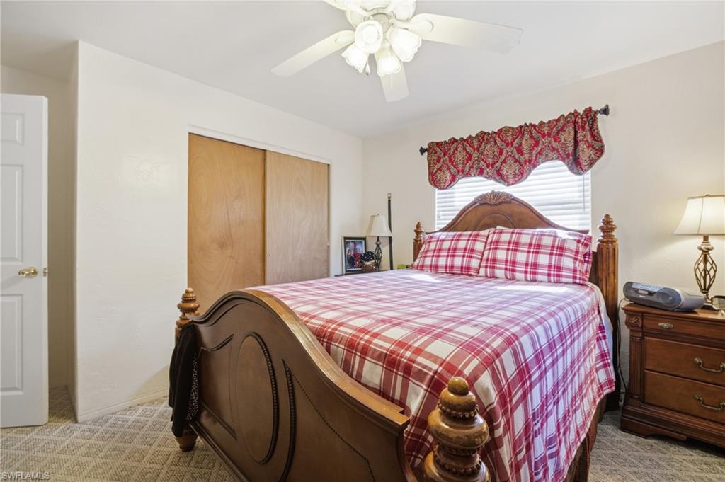 Bedroom with a closet and ceiling fan